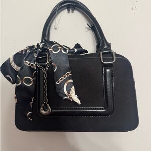 Elegant Black Handbag with Scarf Accent